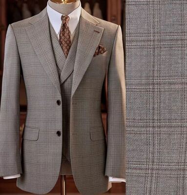 12% wol TR Check Suiting Stof combineert klassieke elegantie met moderne verfijning.